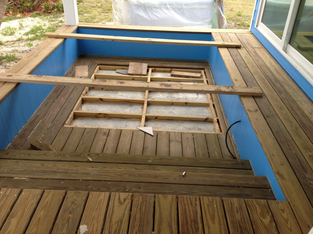 The sunken area of the deck is ready for the hot tub (wrapped in plastic - in the top of the picture). 